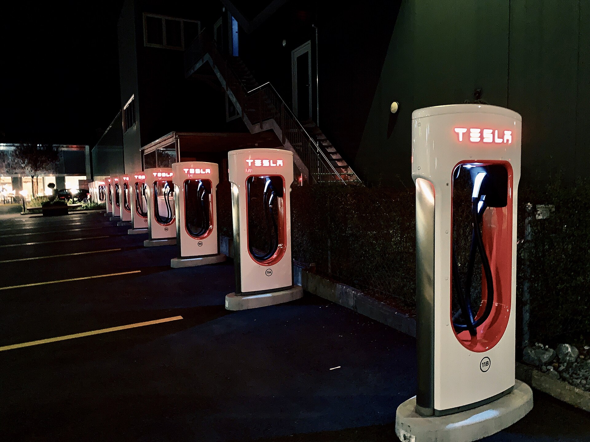 A Tesla Supercharger station — the connector standard NACS is now pushing across the industry.